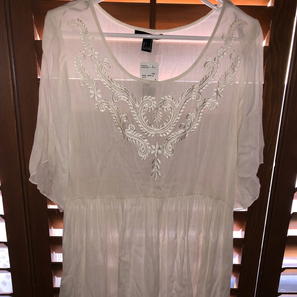 Beautiful embroider cream dress